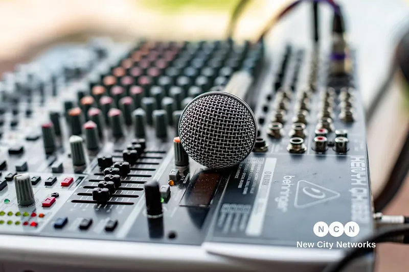 The Nguzo Saba sound desk and microphone set up for a performance